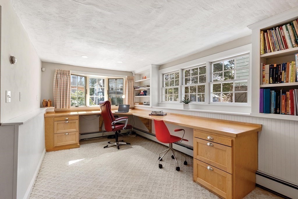 16 Conant Road Brookline, MA 02467 - Photo 16 of 31 a living room with furniture cabinets and a window