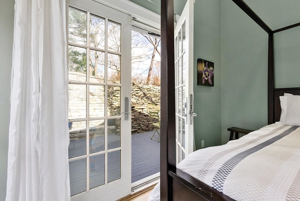 16 Conant Road Brookline, MA 02467 - Photo 24 of 31 a bedroom with a bed and a window