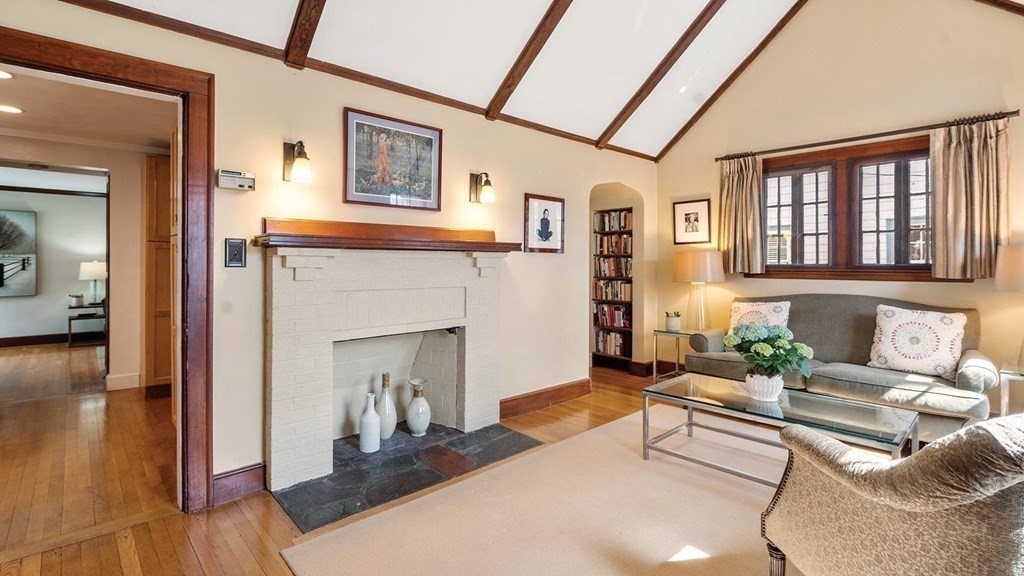 16 Conant Road Brookline, MA 02467 - Photo 8 of 31 a living room with furniture and a fireplace