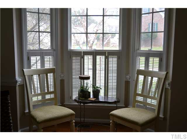 6937 Lamarsh Court Raleigh, NC 27617 - Photo 7 of 25 a living room with furniture and windows