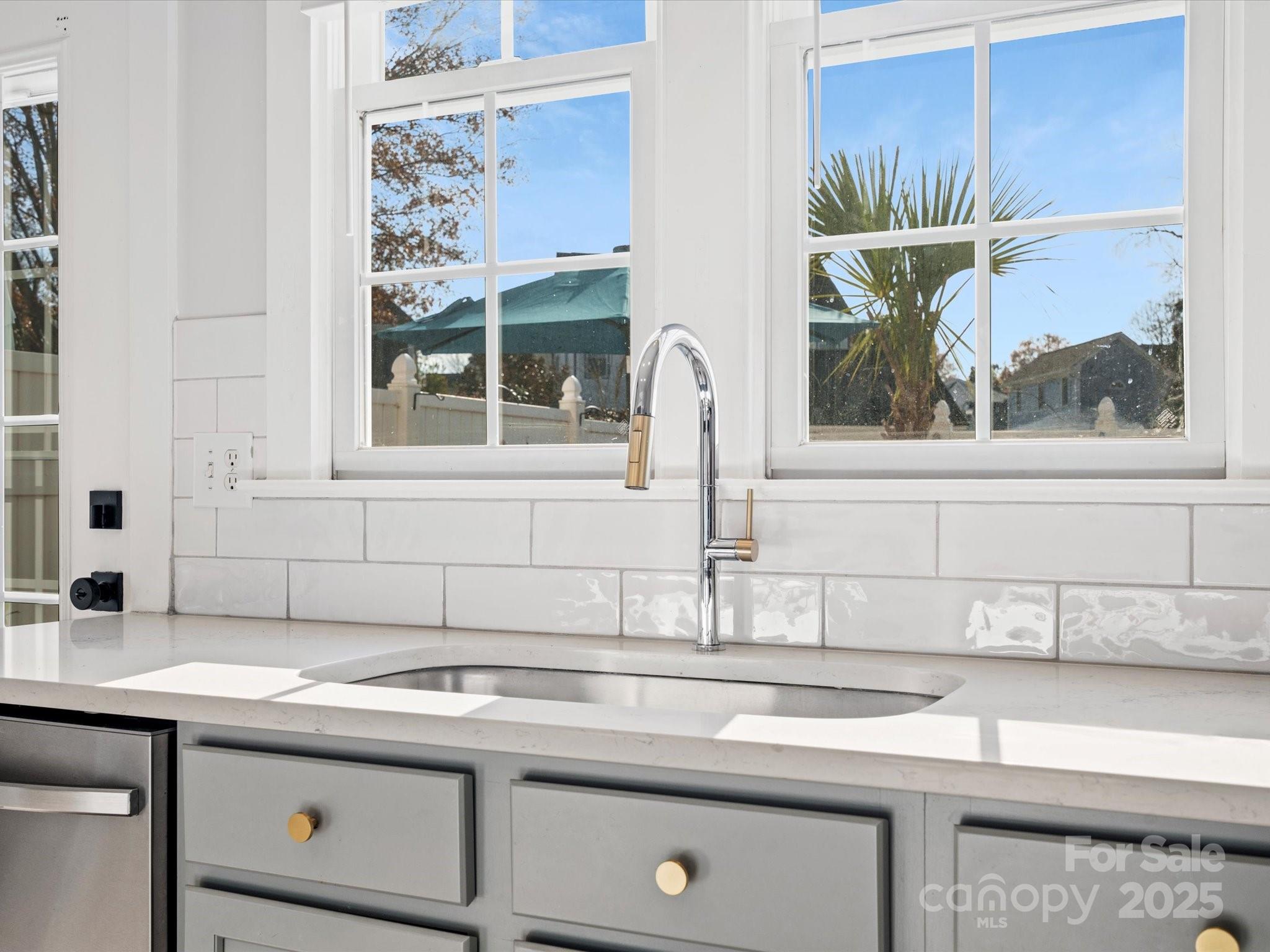 296 Elis Way Fort Mill, SC 29708 - Photo 12 of 31 a view with granite countertop a sink and a window
