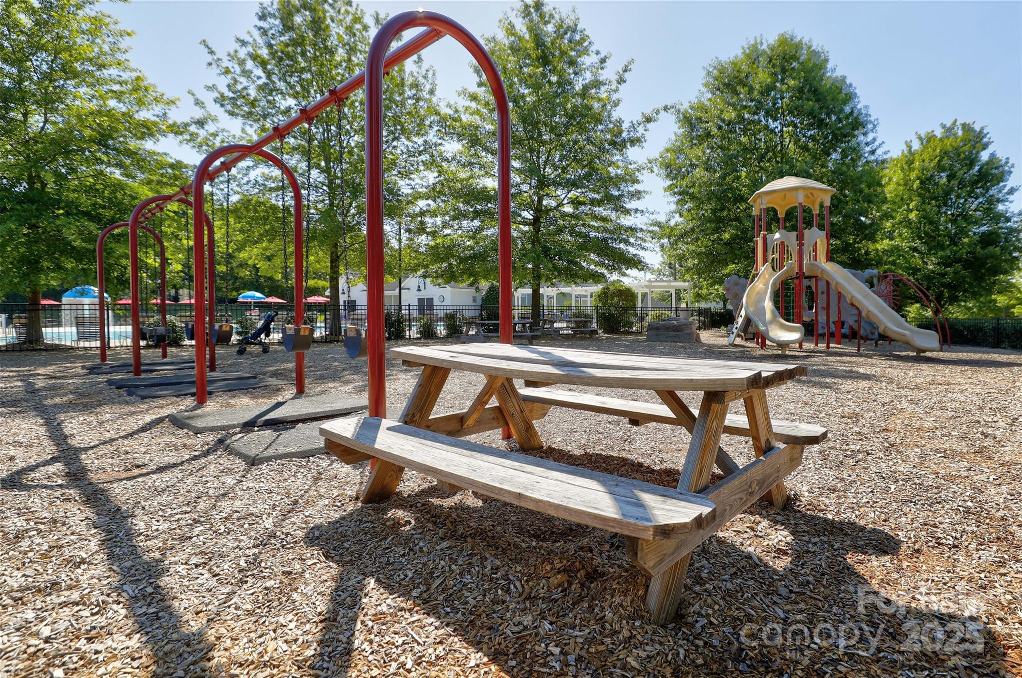 296 Elis Way Fort Mill, SC 29708 - Photo 29 of 31 a park view with a sitting space and trees