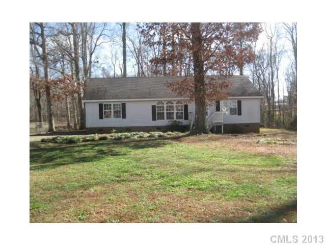 1756 Martin Road Kings Mountain, NC 28086 - Photo 1 of 12 a house view with a garden space