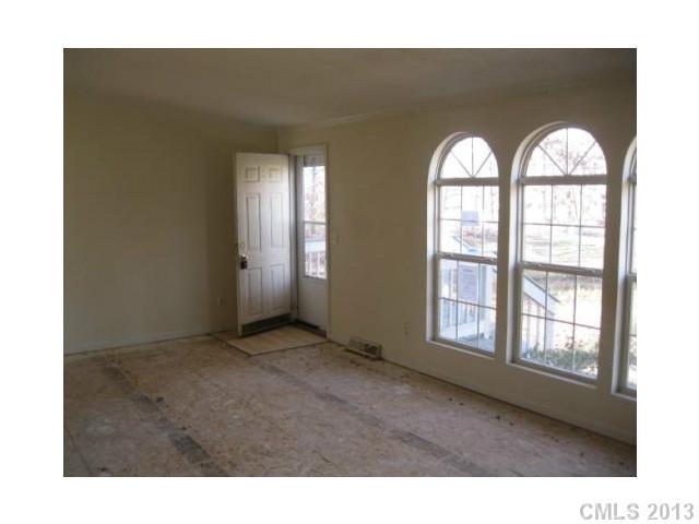 1756 Martin Road Kings Mountain, NC 28086 - Photo 5 of 12 a view interior of a house with wooden floor and windows