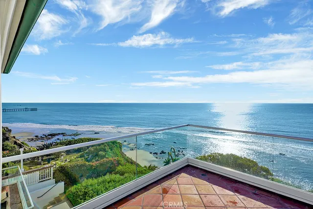 a view of an ocean from a balcony
