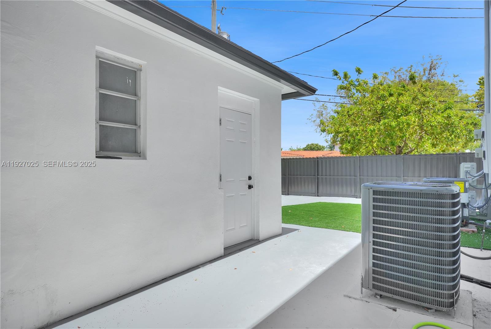 210 Beacom Boulevard, Unit B Miami, FL 33135 - Photo 8 of 9 a backyard of a house