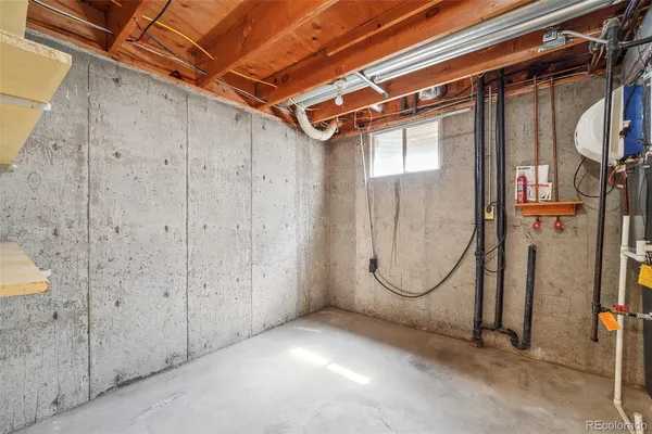 a view of a room with wooden walls