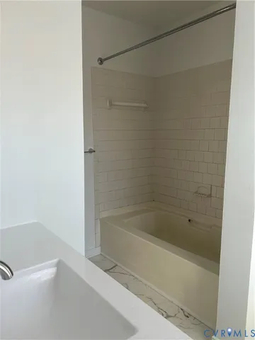a bathroom with a bathtub