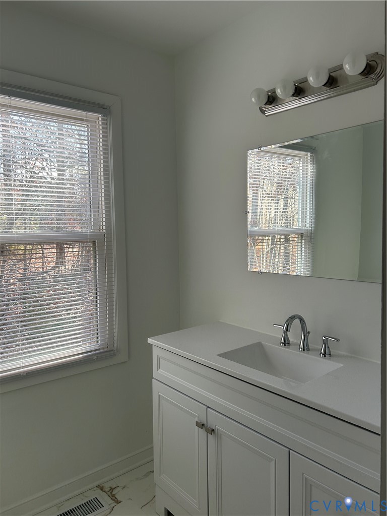 18086 Old Ridge Road Montpelier, VA 23192 - Photo 16 of 21 a bathroom with a sink and a window