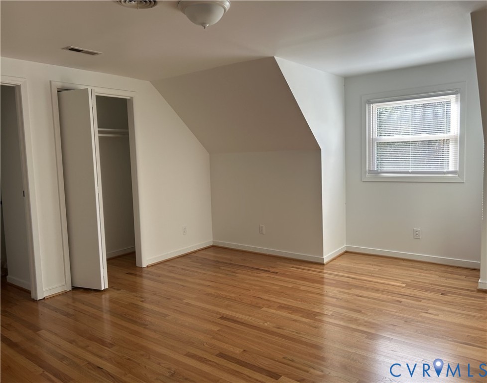 18086 Old Ridge Road Montpelier, VA 23192 - Photo 17 of 21 a view of an empty room with wooden floor and a window