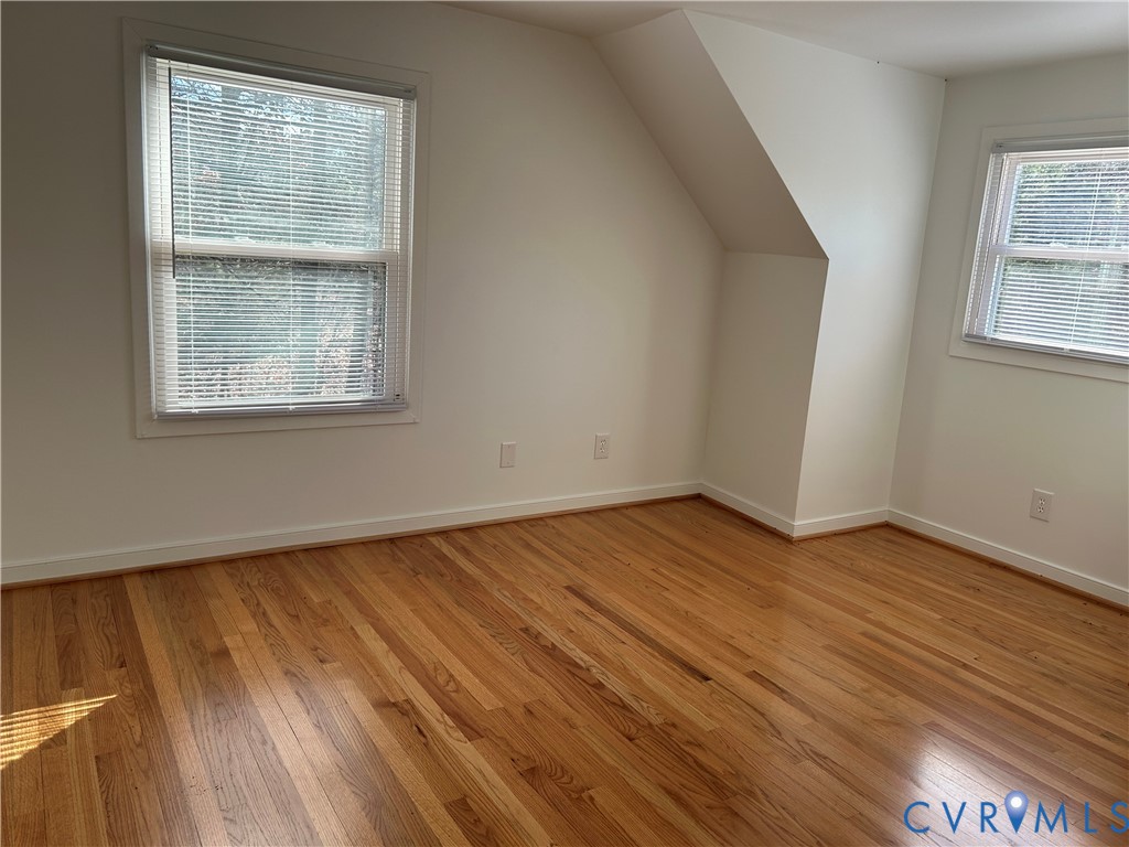18086 Old Ridge Road Montpelier, VA 23192 - Photo 18 of 21 an empty room with wooden floor and windows