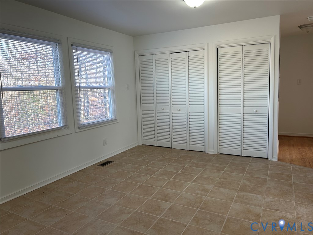 18086 Old Ridge Road Montpelier, VA 23192 - Photo 5 of 21 an empty room with windows