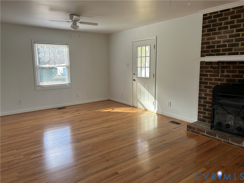 18086 Old Ridge Road Montpelier, VA 23192 - Photo 8 of 21 wooden floor in an empty room with a window