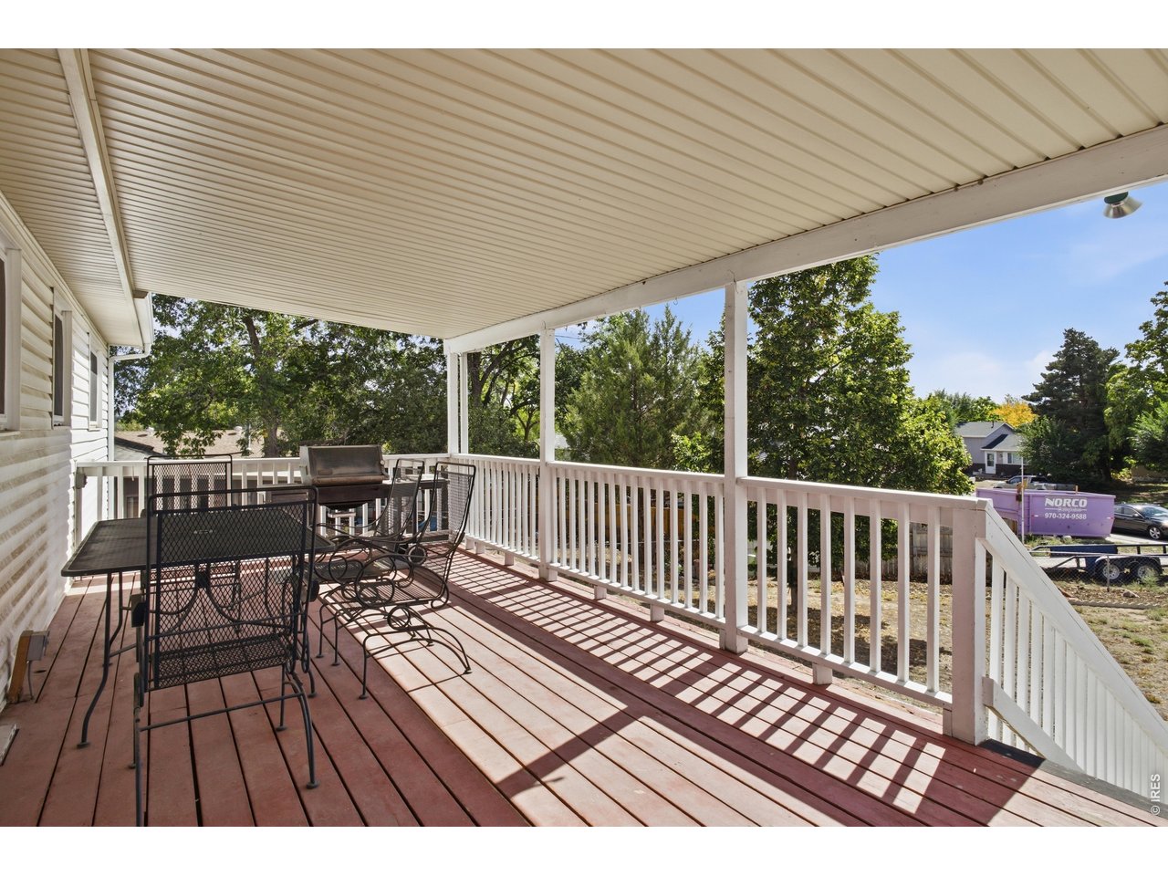 3346 West 19th St Road Greeley, CO 80634 - Photo 15 of 34 Oversized covered back deck