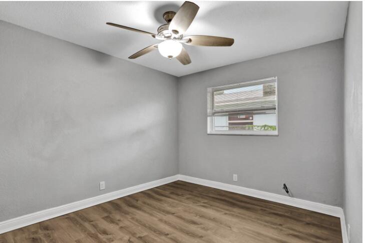 240 Southeast 9th Avenue, Unit 2 Pompano Beach, FL 33060 - Photo 13 of 17 wooden floor in a room