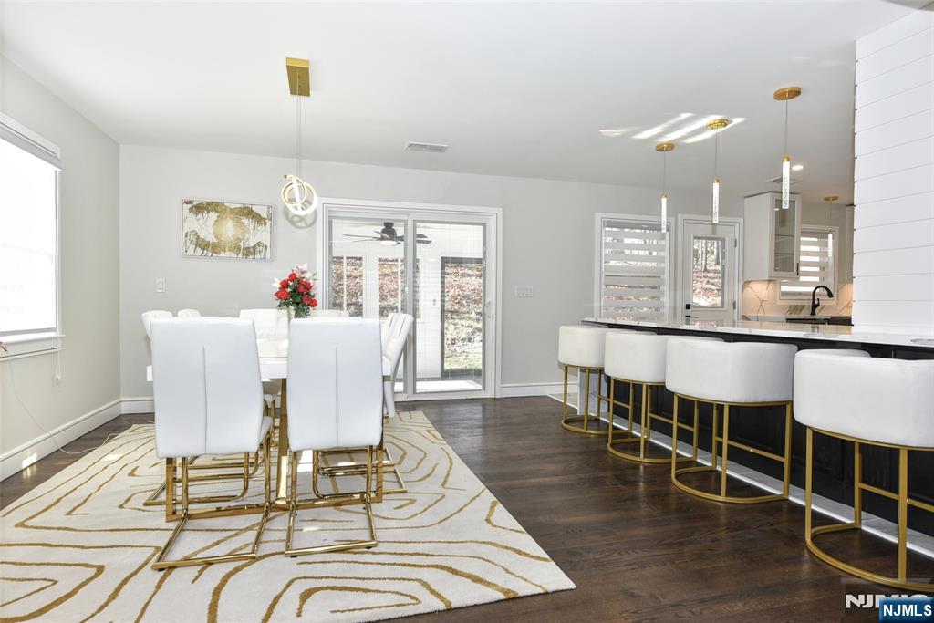 28 Overlook Road Saddle River, NJ 07458 - Photo 12 of 35 a view of a dining room with furniture window and wooden floor