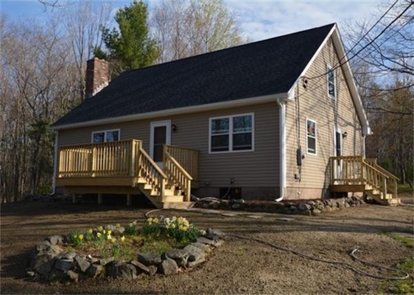 19 Zuell Hill Road Monson, MA 01057 - Photo 1 of 27 a front view of a house with a yard