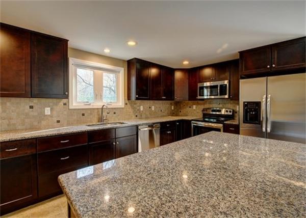19 Zuell Hill Road Monson, MA 01057 - Photo 4 of 27 a kitchen with stainless steel appliances granite countertop a sink stove and refrigerator