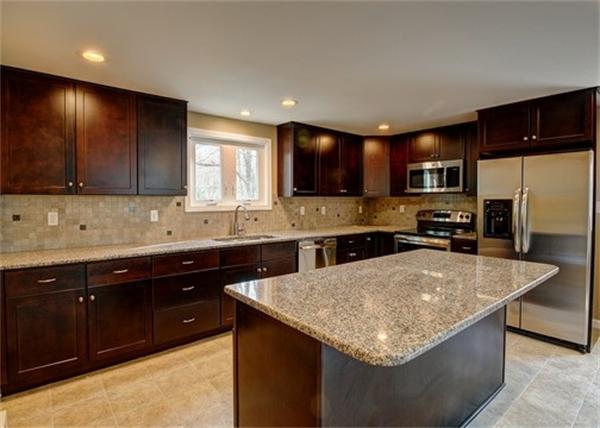 19 Zuell Hill Road Monson, MA 01057 - Photo 7 of 27 a kitchen with stainless steel appliances granite countertop a sink counter space cabinets and a large window