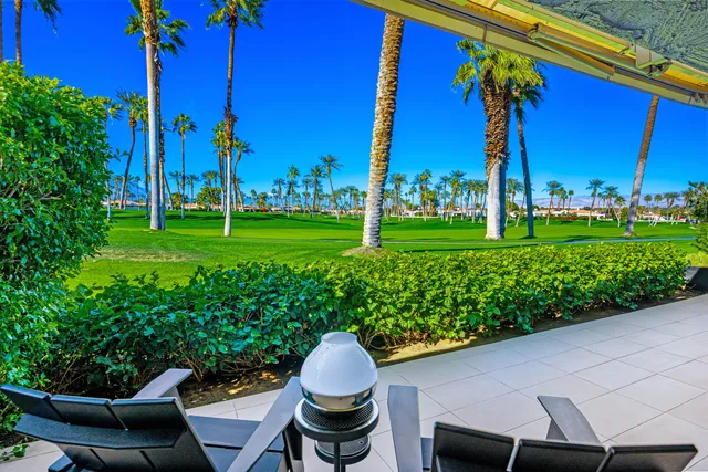 a view of swimming pool with a patio