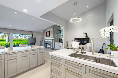 a bedroom with a bed closet and large window