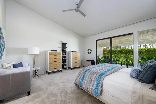 a bathroom with a sink vanity granite and a mirror