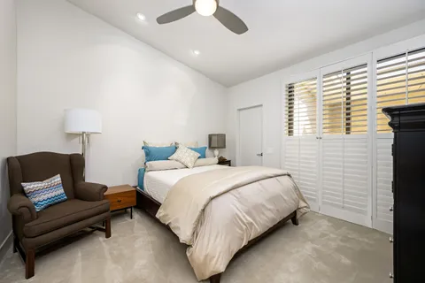 a view of a golf course with a lake view