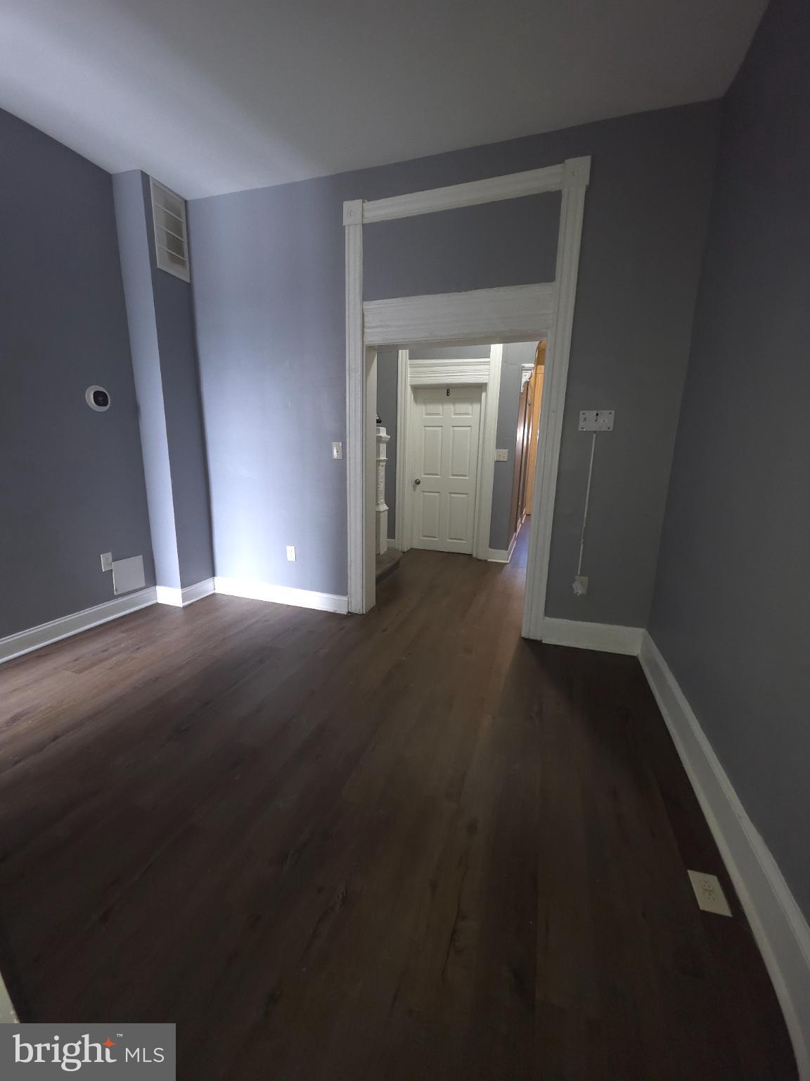 2617 East Preston Street Baltimore, MD 21213 - Photo 12 of 30 a view of a livingroom with wooden floor