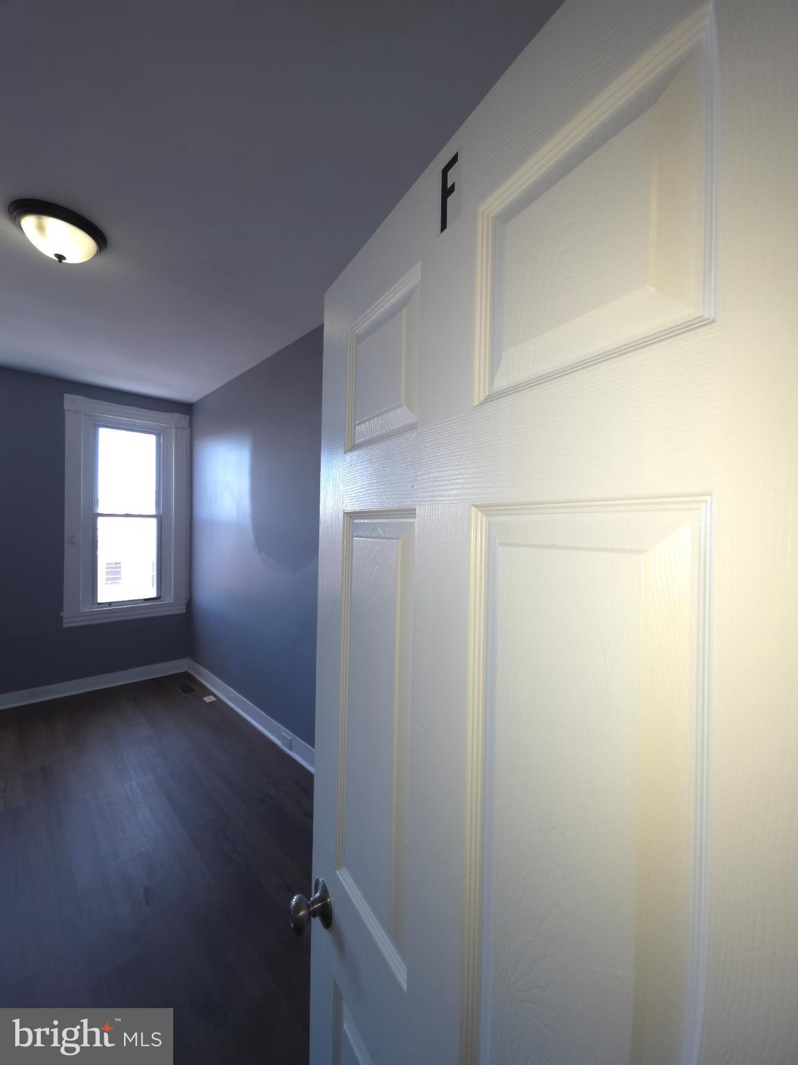 2617 East Preston Street Baltimore, MD 21213 - Photo 24 of 30 a view of an empty room with a window