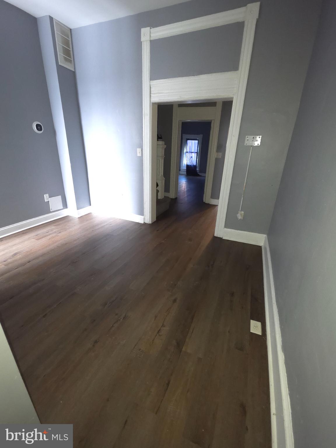 2617 East Preston Street Baltimore, MD 21213 - Photo 5 of 30 a view of hallway with wooden floor