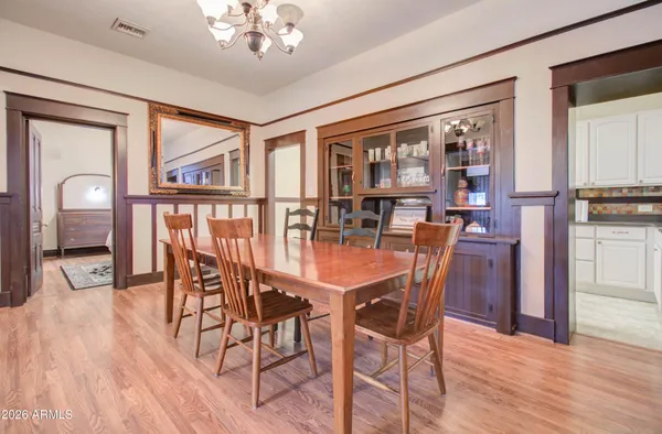 a kitchen with stainless steel appliances a refrigerator sink and cabinets