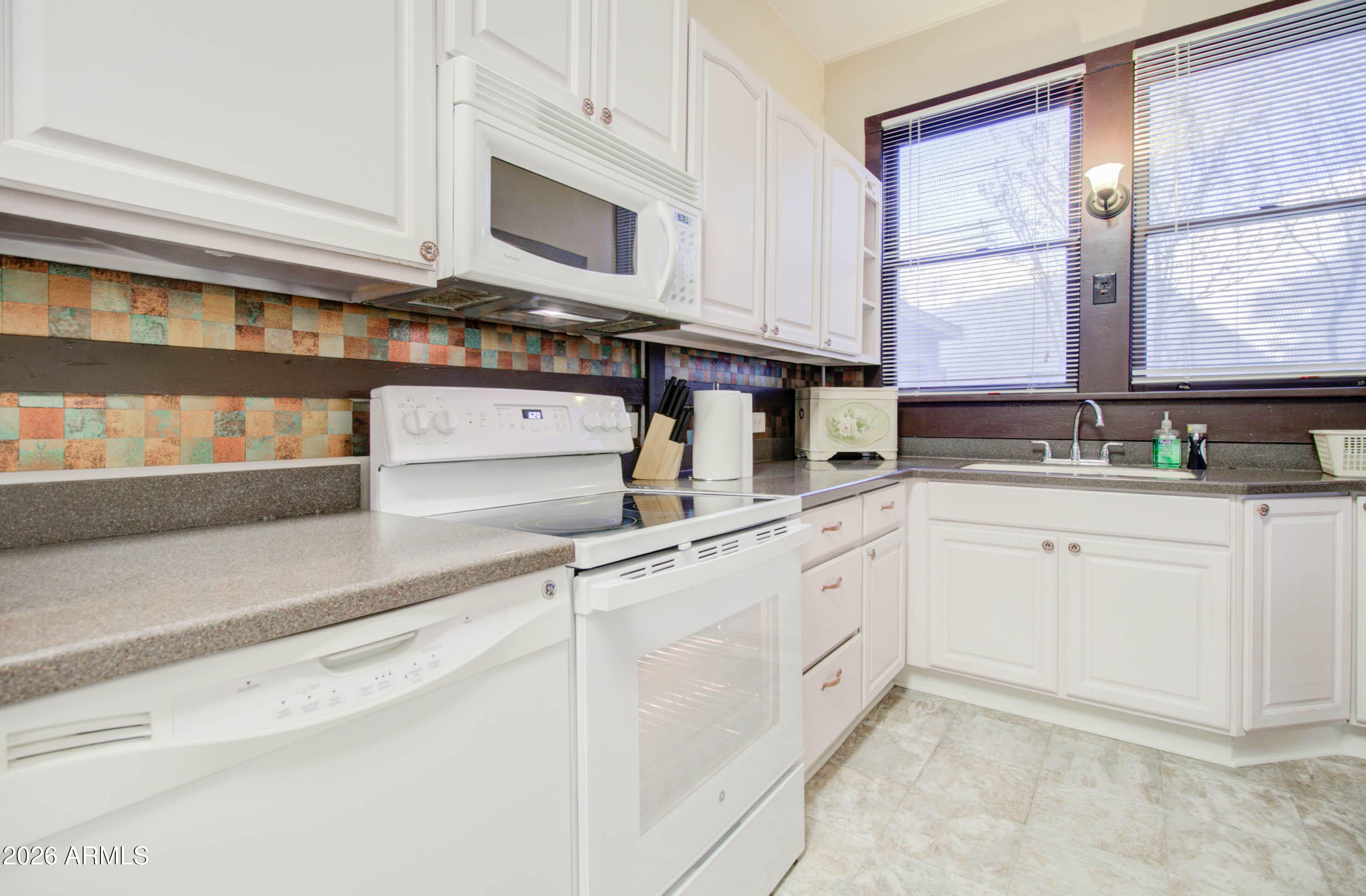 385 South Broad Street Globe, AZ 85501 - Photo 15 of 36 a kitchen with appliances cabinets and a sink