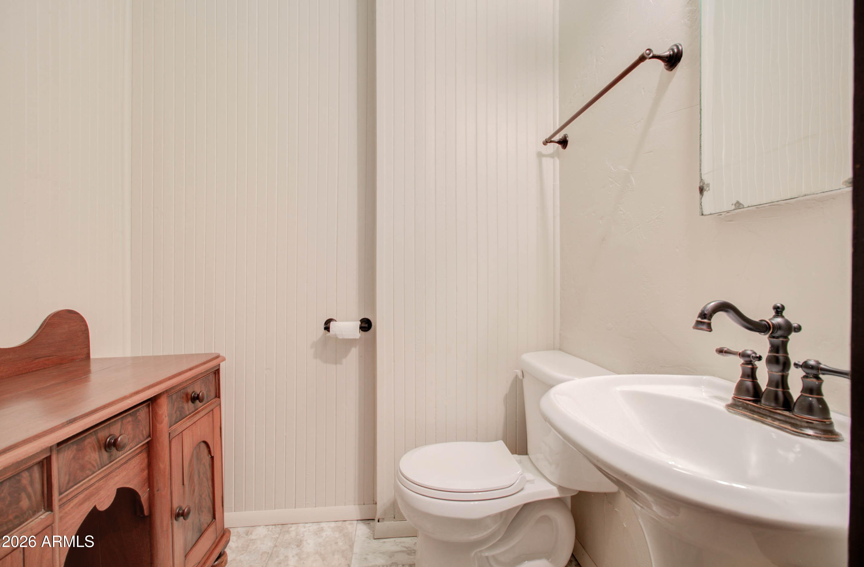 385 South Broad Street Globe, AZ 85501 - Photo 26 of 36 a bathroom with a sink a toilet and a mirror