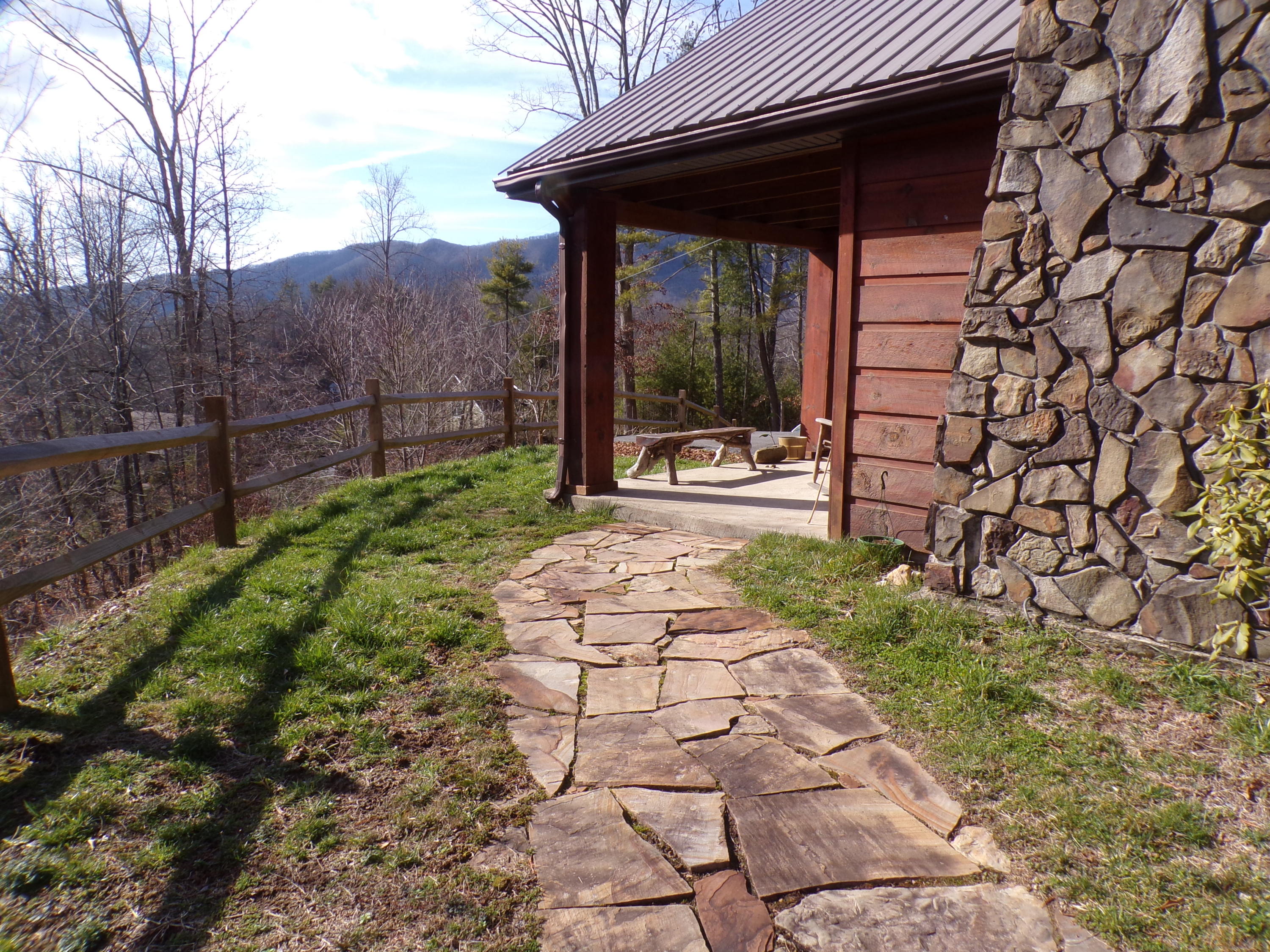 582 Cove Ridge Circle Butler, TN 37640 - Photo 25 of 34 Stone & Log Sided