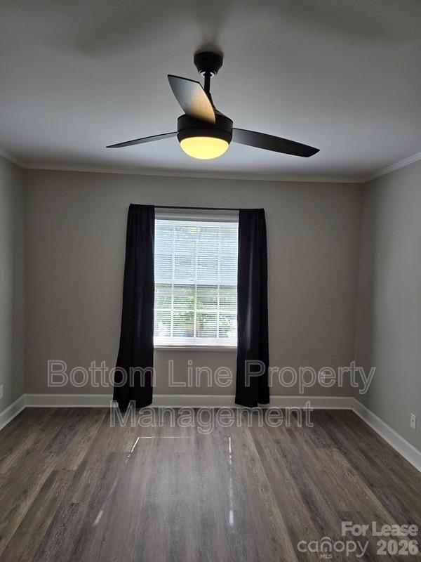 5949 Quail Hollow Road, Unit D Charlotte, NC 28210 - Photo 24 of 34 a view of an empty room with a window