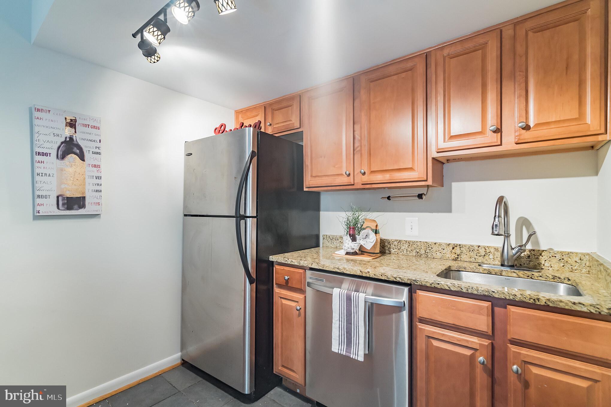 8618 Manchester Road, Unit 2 Silver Spring, MD 20901 - Photo 17 of 39 Modern kitchen with stainless steel appliances,