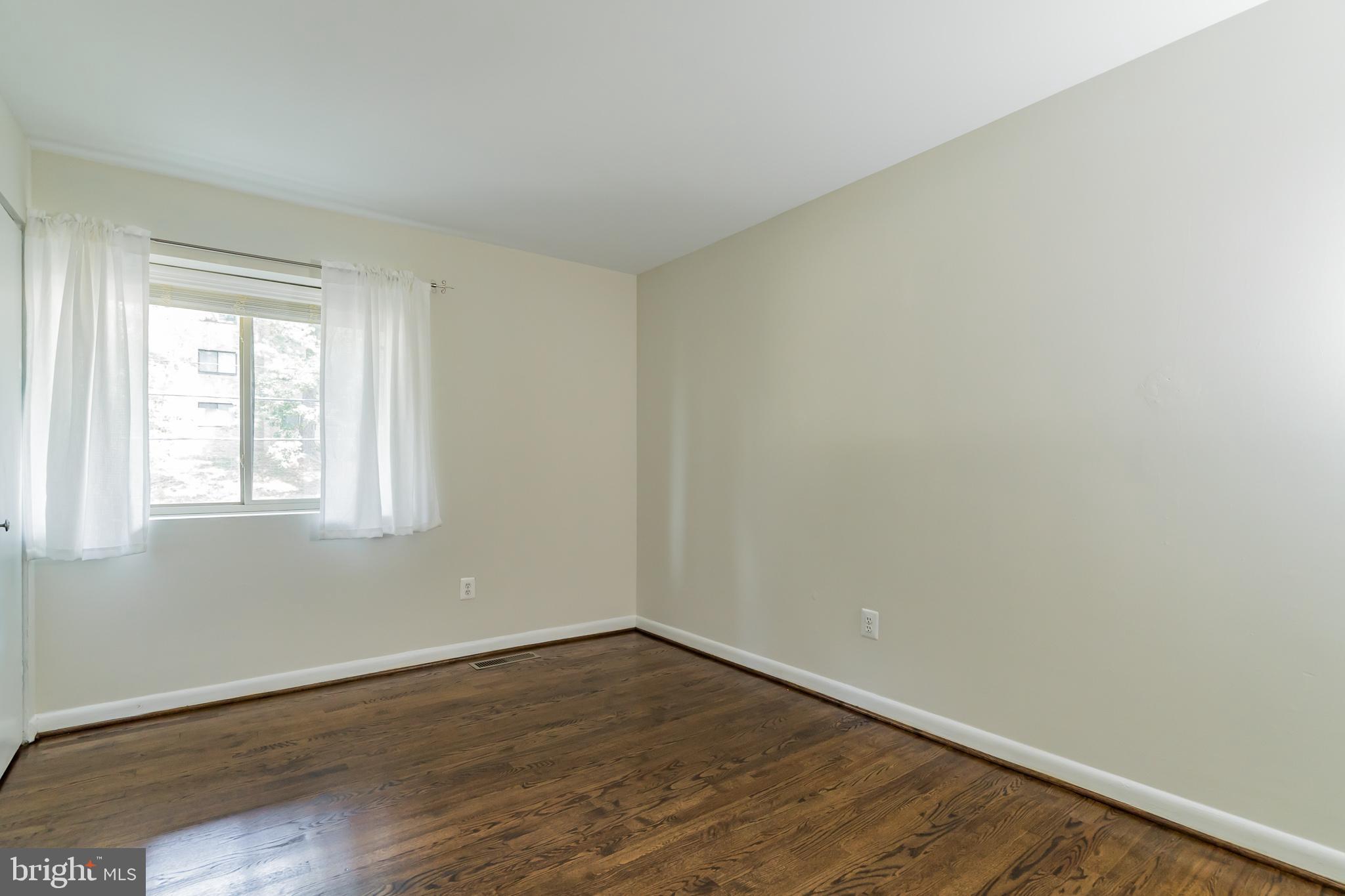 8618 Manchester Road, Unit 2 Silver Spring, MD 20901 - Photo 30 of 39 Roomy, light-filled second bedroom...