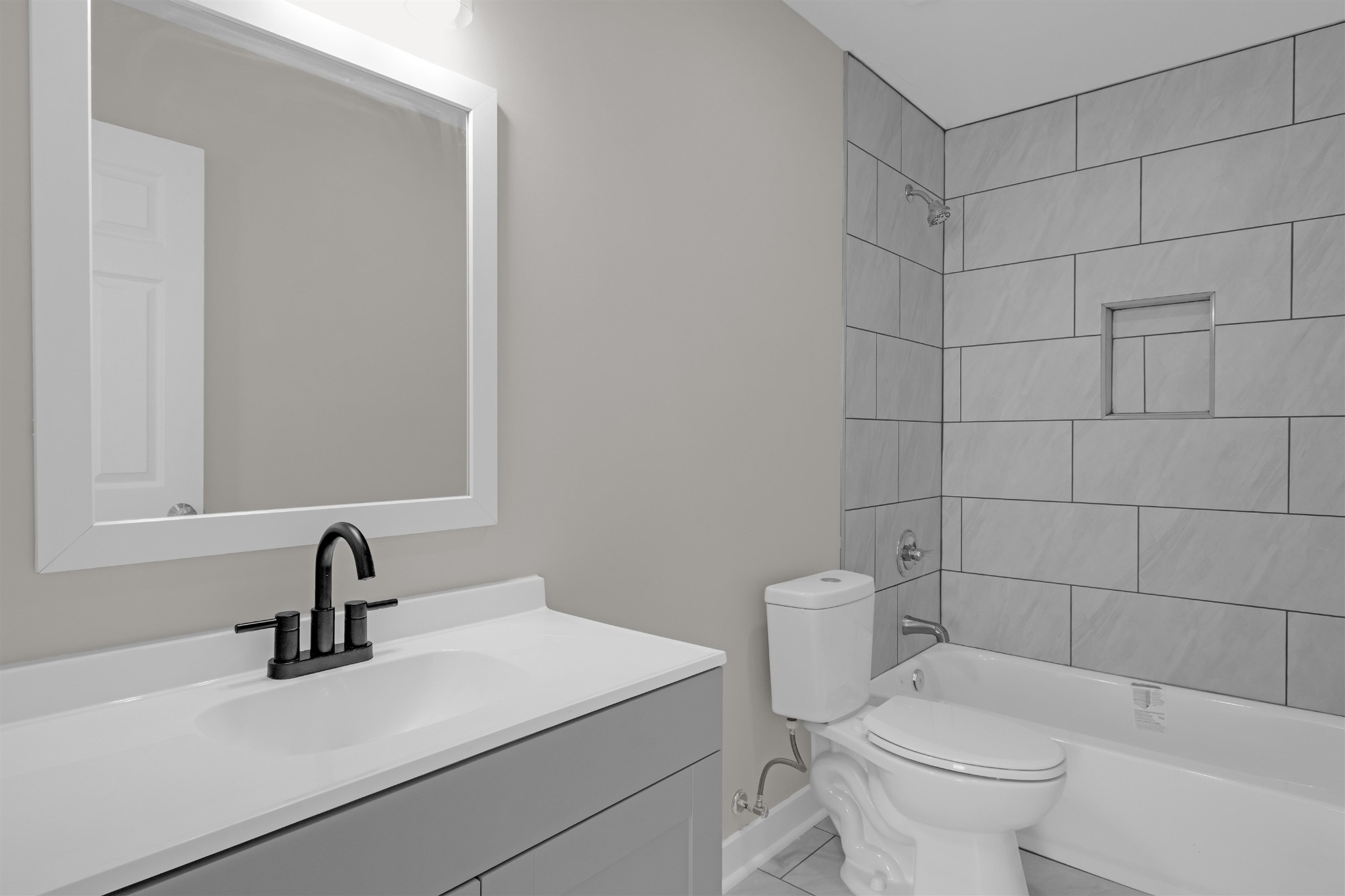 830 David Street Memphis, TN 38114 - Photo 12 of 16 a bathroom with a sink toilet and a mirror