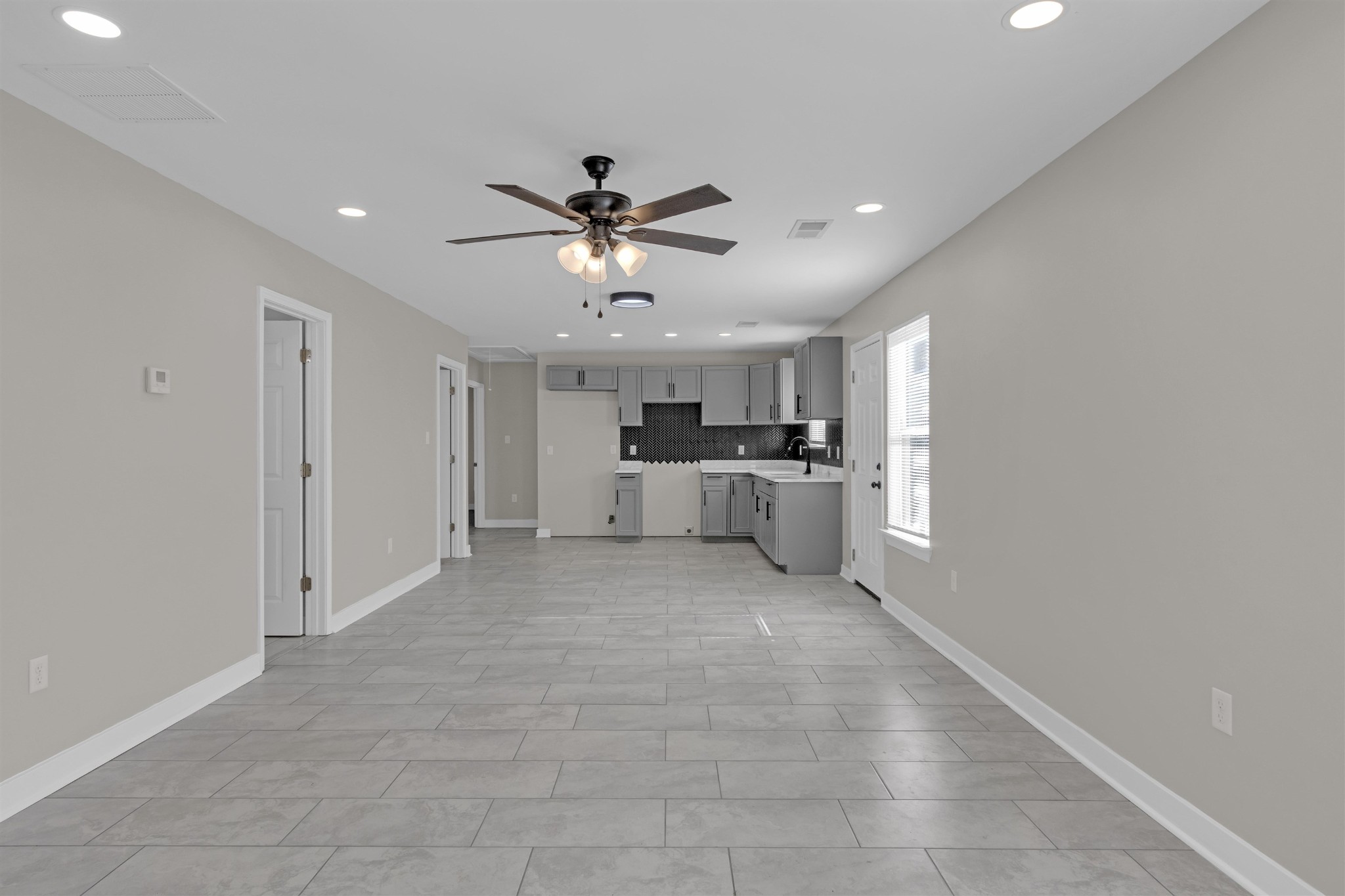 830 David Street Memphis, TN 38114 - Photo 3 of 16 a view of a kitchen with a sink and a window