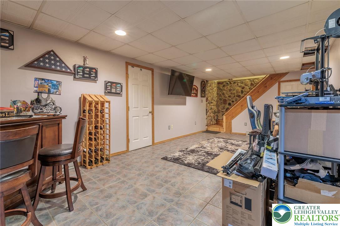 2170 Clearview Road Coplay, PA 18037 - Photo 53 of 75 This versatile basement space offers a comfortable area for recreation and relaxation with tile flooring.