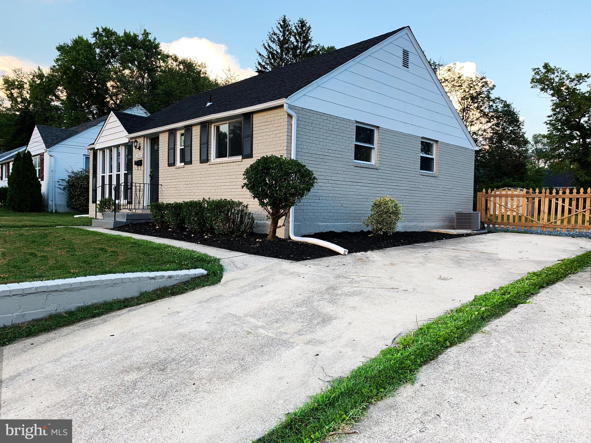 12707 Gould Road Silver Spring, MD 20906 - Photo 2 of 23 a view of a house with backyard and garden
