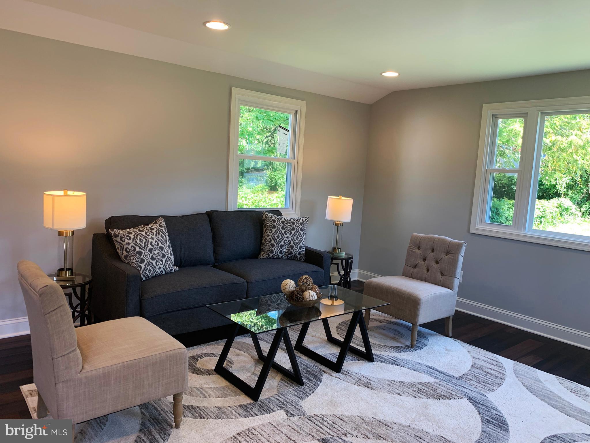 12707 Gould Road Silver Spring, MD 20906 - Photo 14 of 23 a living room with furniture and a window