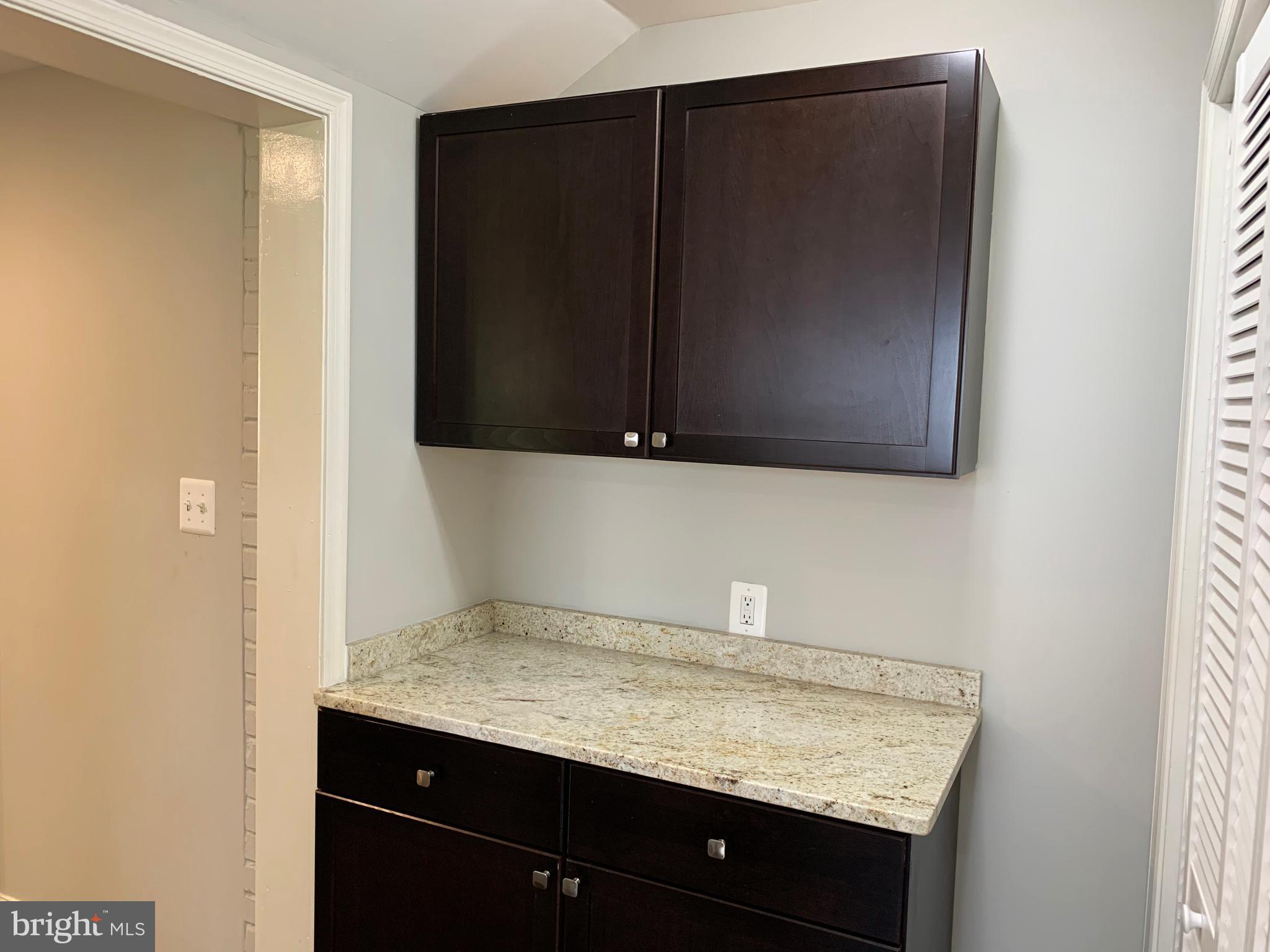 12707 Gould Road Silver Spring, MD 20906 - Photo 10 of 23 a view of cabinets