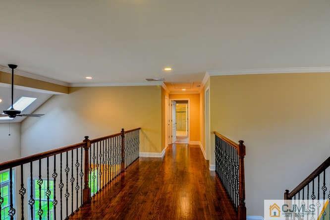 5 Homestead Road Edison, NJ 08820 - Photo 17 of 25 a view of a hallway with wooden floor