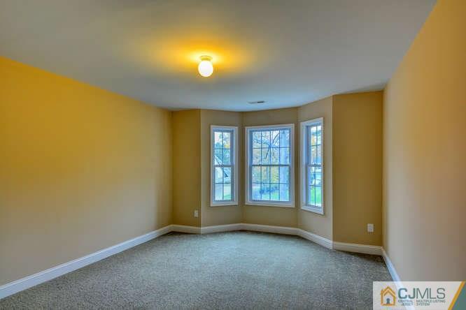 5 Homestead Road Edison, NJ 08820 - Photo 18 of 25 an empty room with windows
