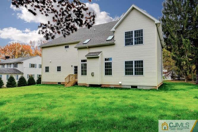 5 Homestead Road Edison, NJ 08820 - Photo 3 of 25 a big house with a big yard and more fence