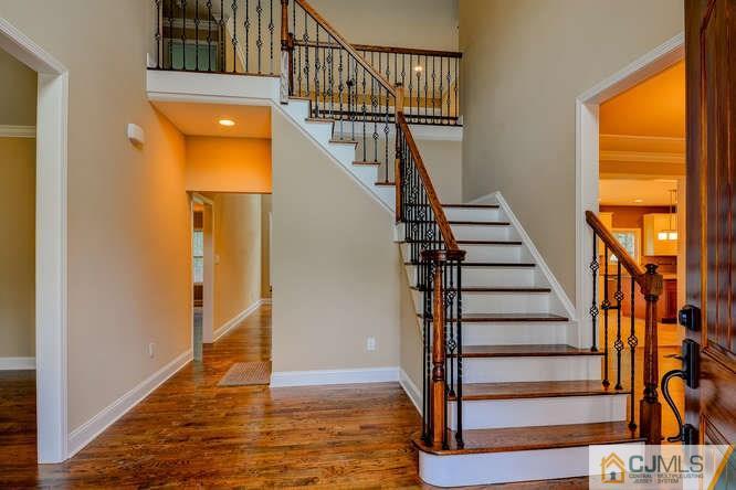 5 Homestead Road Edison, NJ 08820 - Photo 4 of 25 a view of entryway and hall with wooden floor