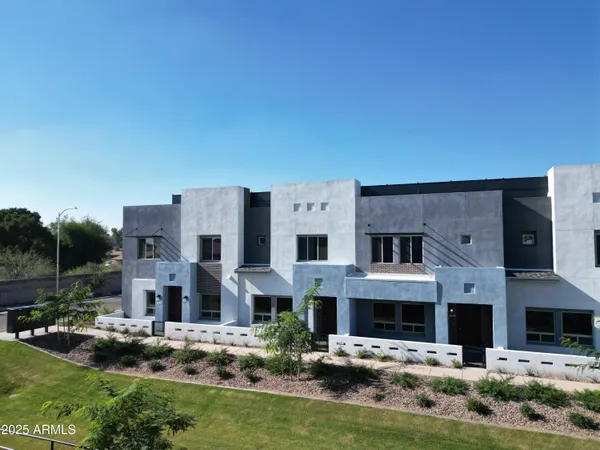 a view of building with yard