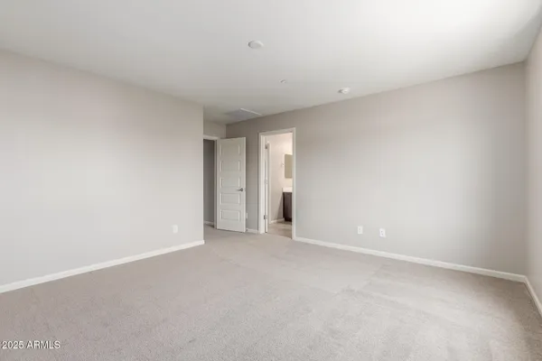 a bathroom with a double vanity sink mirror double and shower