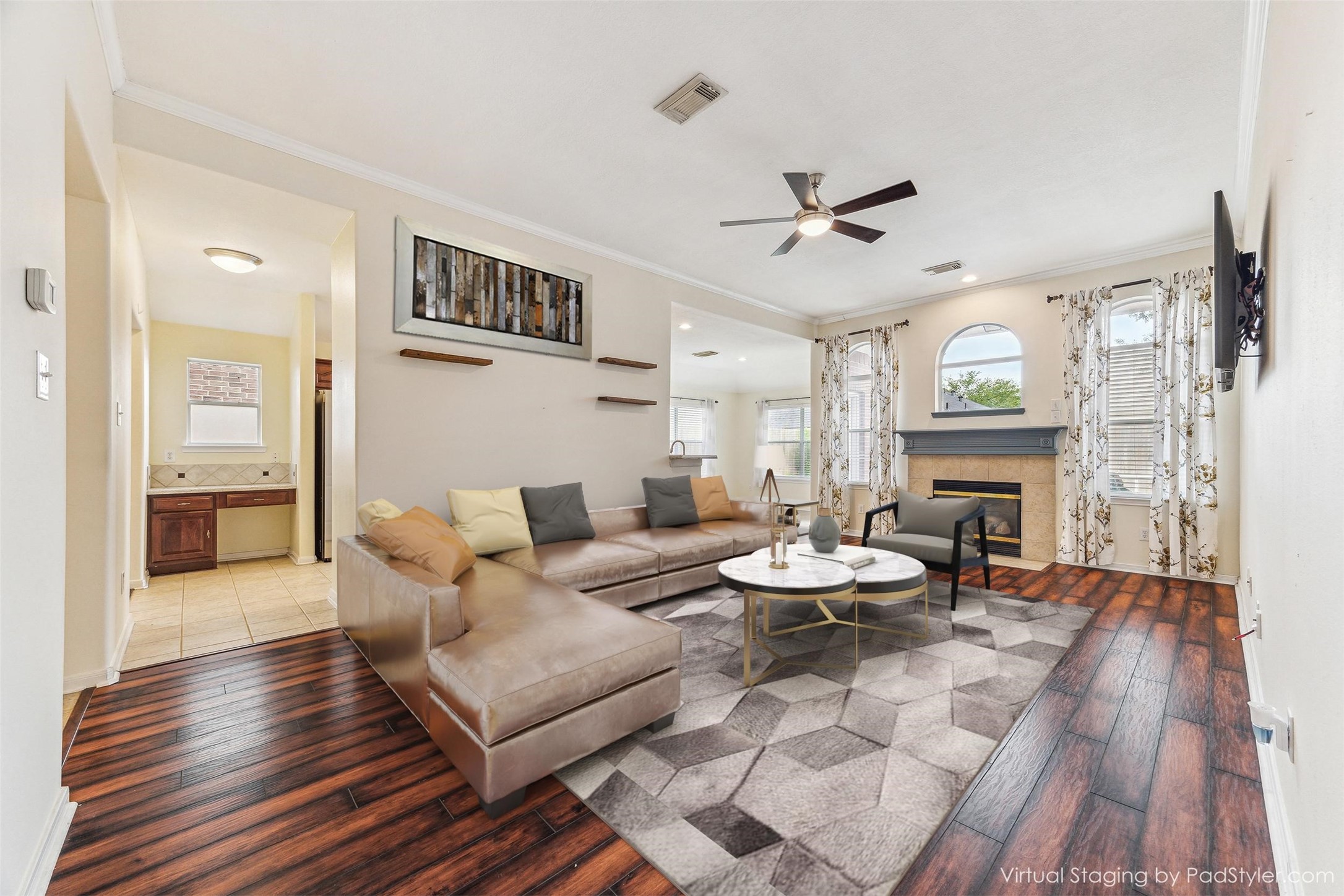 5716 Meadow Breeze Lane Rosharon, TX 77583 - Photo 11 of 24 Staged Family room with beautiful wood floors.